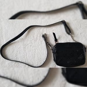 Shiny black crossbody purse